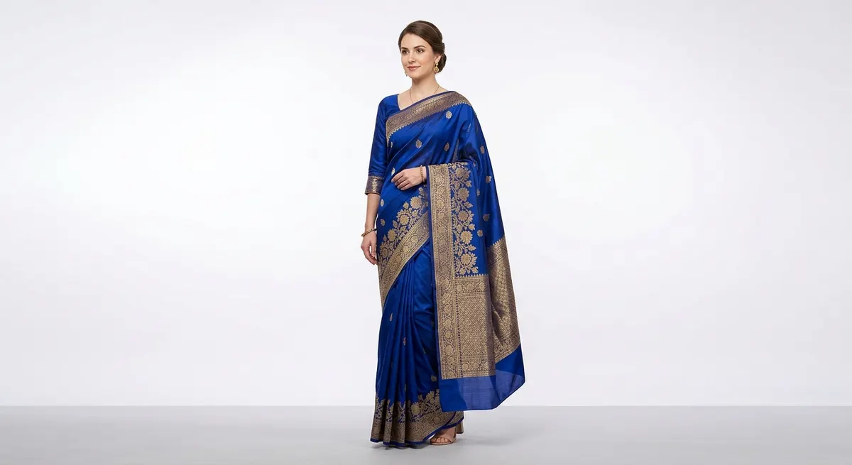 Professional e-commerce photo of model wearing royal blue silk saree — ShotRoom output equivalent to Canon EOS R5 studio quality with marketplace-ready lighting
